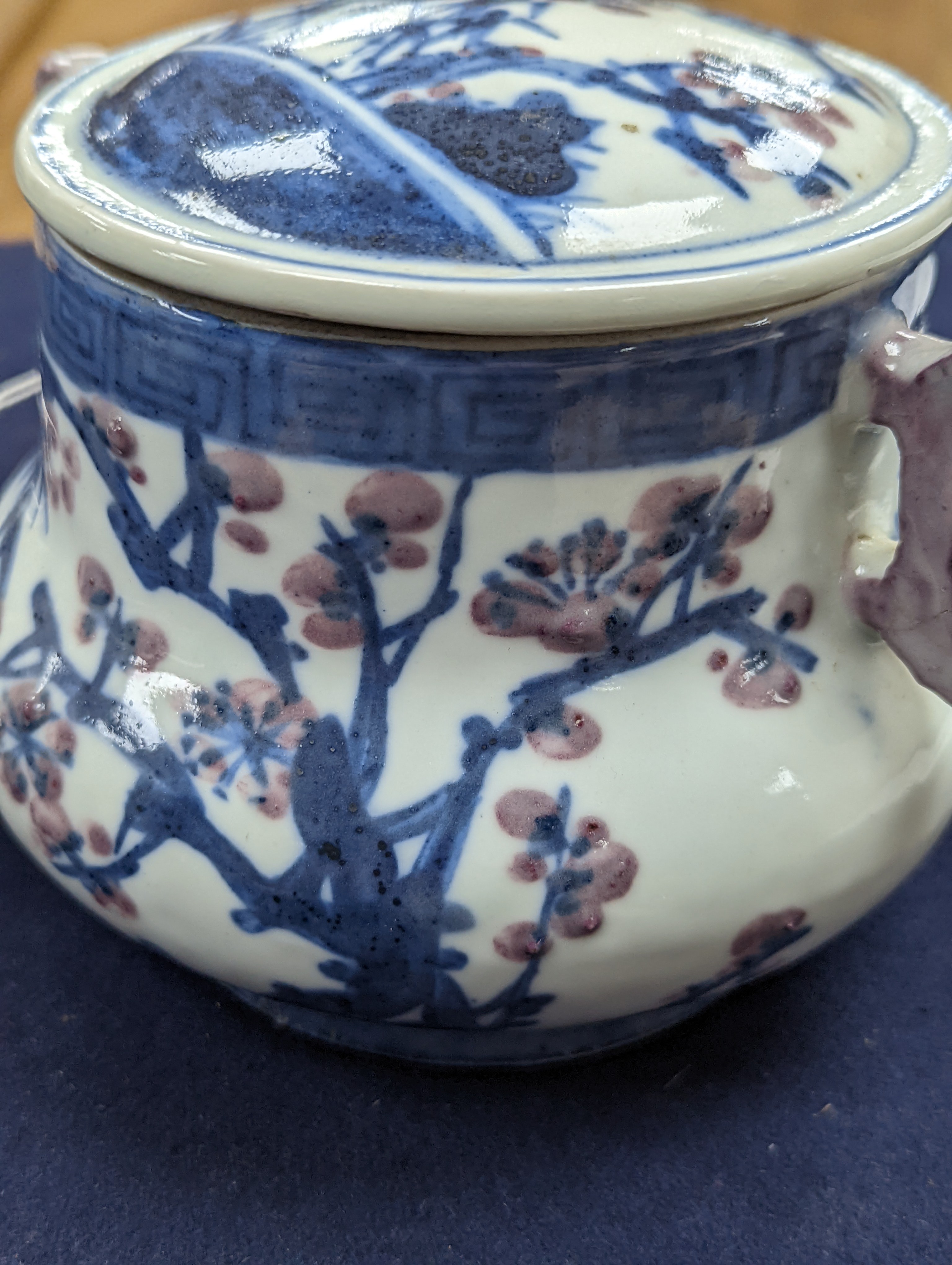 A Chinese underglaze blue and copper red jar and cover, Xuande six character mark but later 12cm